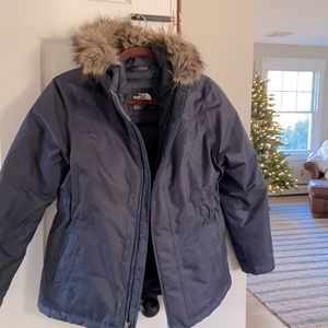 The North Face navy blue Greenland parka .